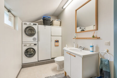Woning met 3 slpk, dubbele garage/bijgebouw en aangelegde tuin - te koop bij Huyskens Vastgoed & Advies